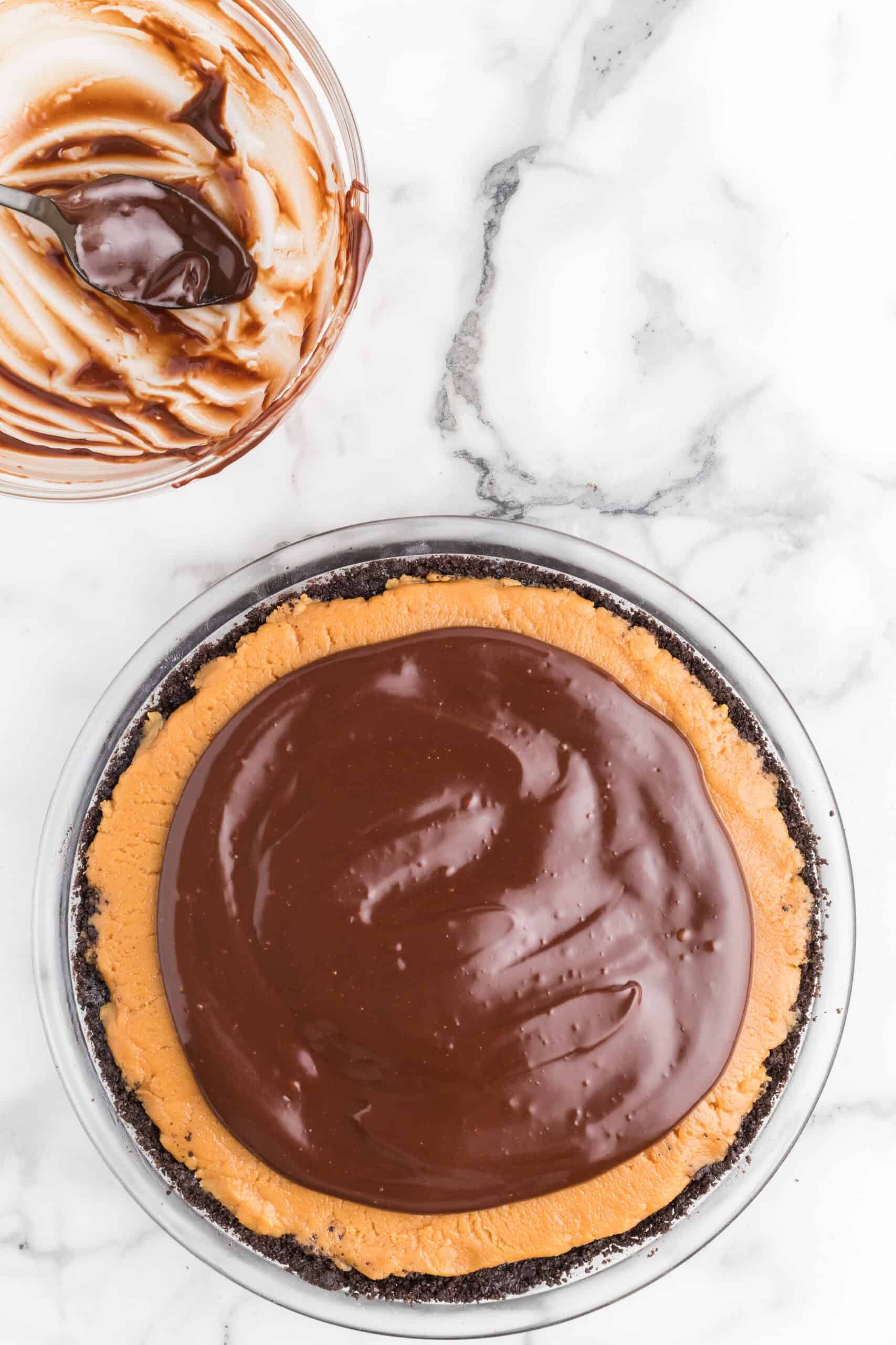 Melted chocolate topped the peanut butter mixture to complete the pie