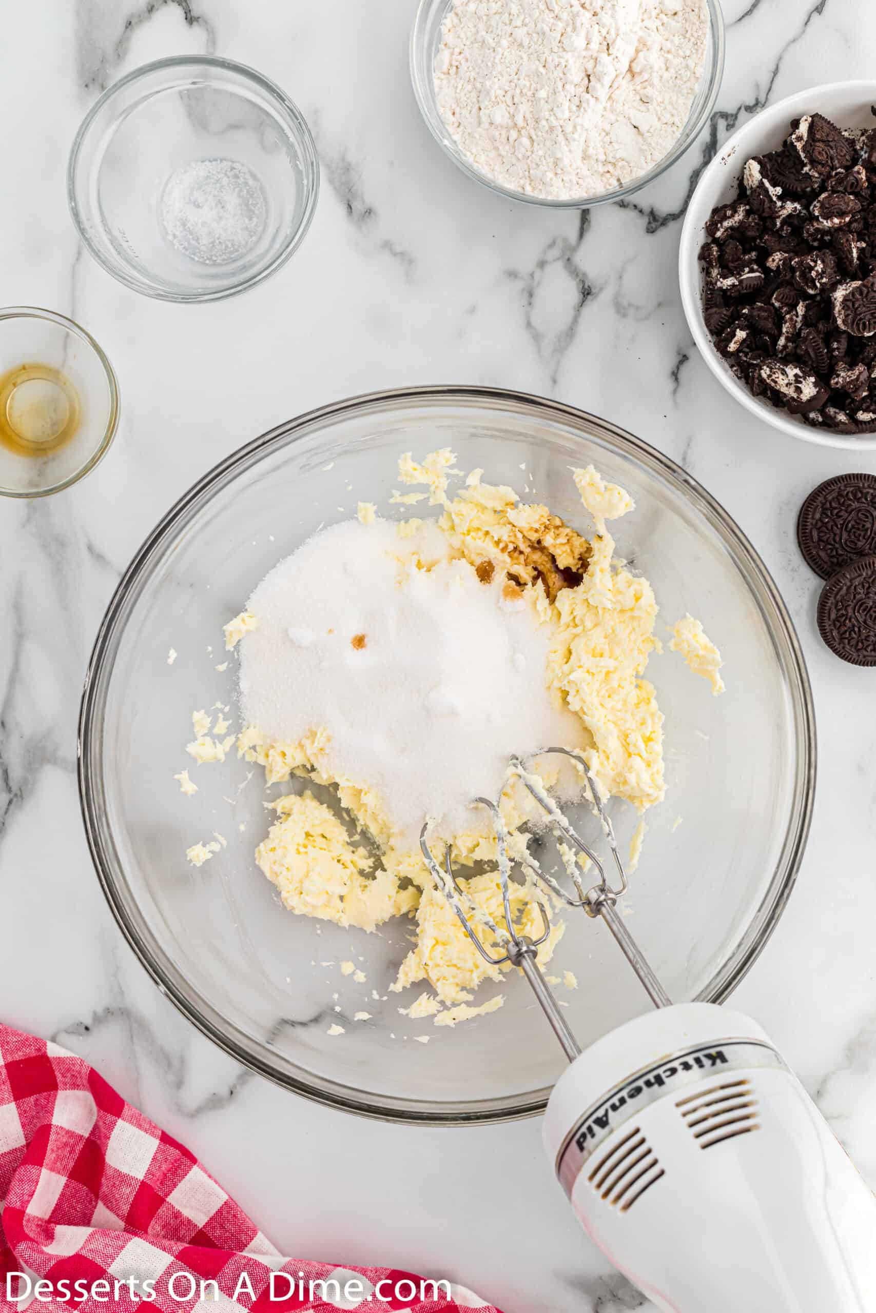 Sugar and vanilla extract added to the cream cheese mixture