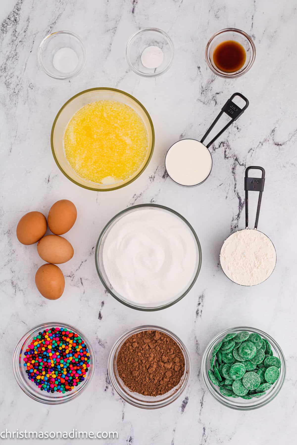 Little Debbie Christmas Tree Brownies ingredients - Sugar, cocoa powder, flour, salt, baking powder, eggs, butter, vanilla extract, green candy melts, heavy whipping cream, candy coated chocolate chips