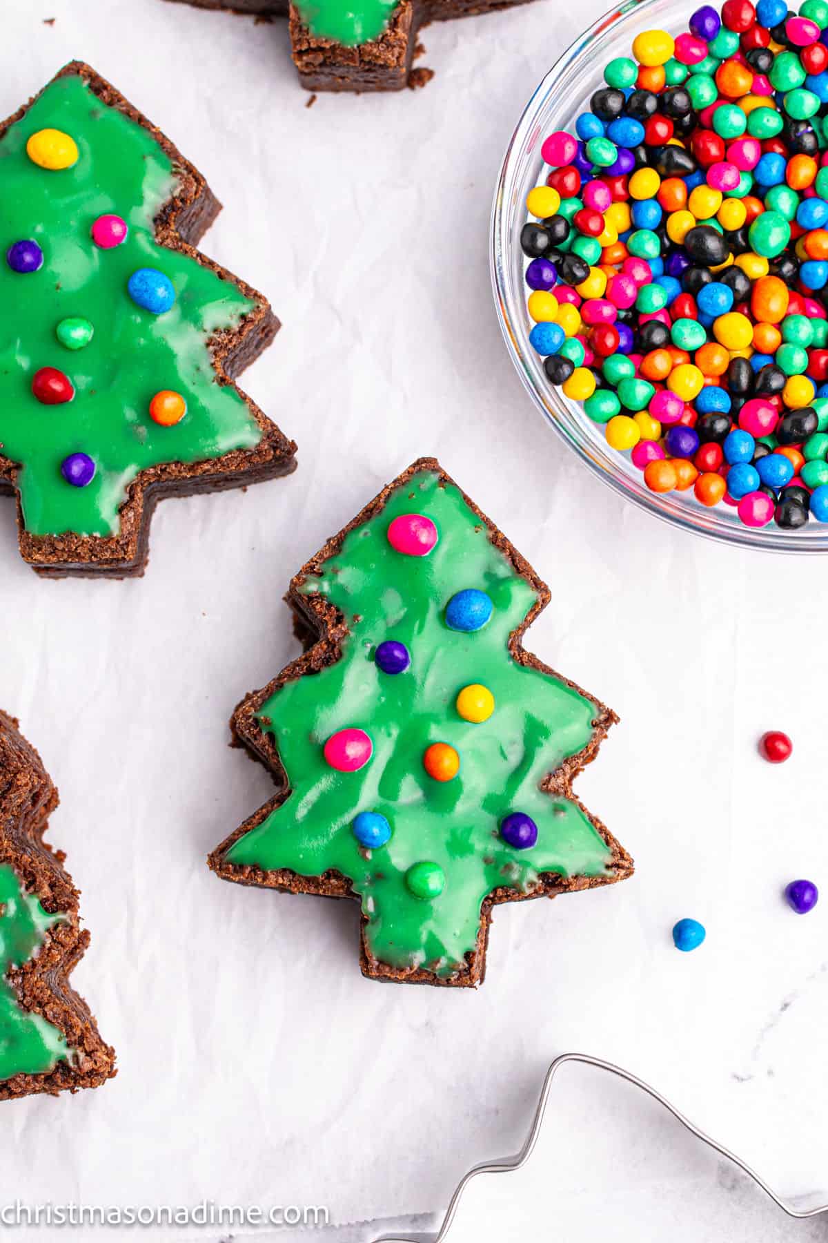 Little Debbie Christmas Tree Brownies topped with green icing and multi color candies