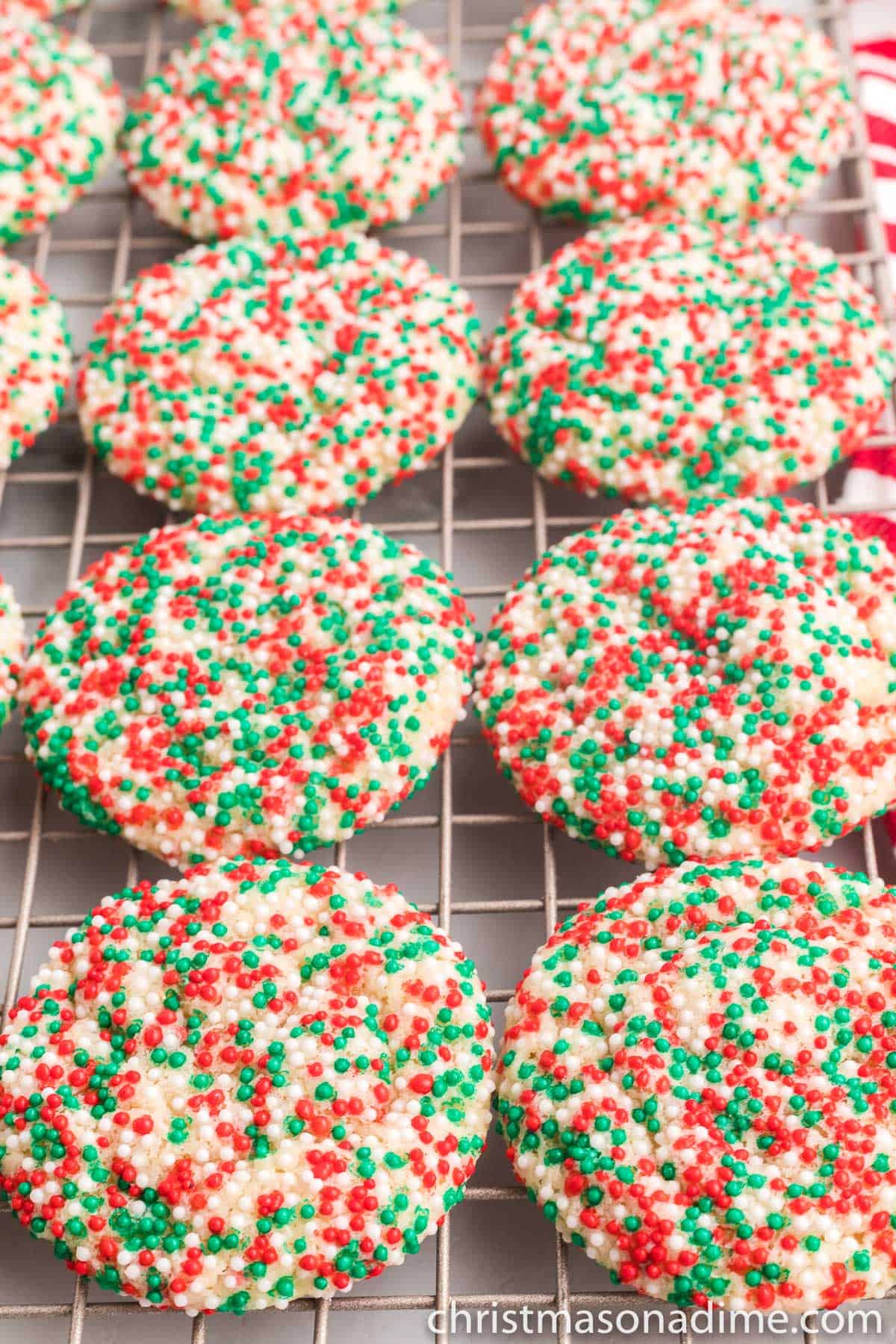 Christmas Sprinkle Cookies on a cooling rack